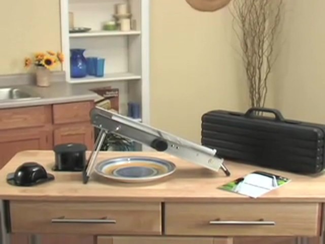 Pro Stainless Steel Mandoline Slicer with Bonus Food Pusher / Receptacle - image 10 from the video